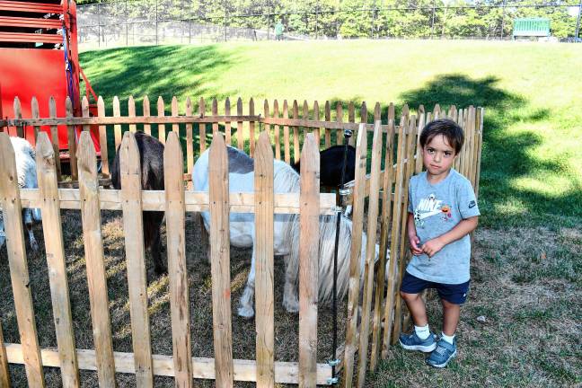 Photos: Byram Fest Nicholas Steen of Byram poses by the petting zoo.