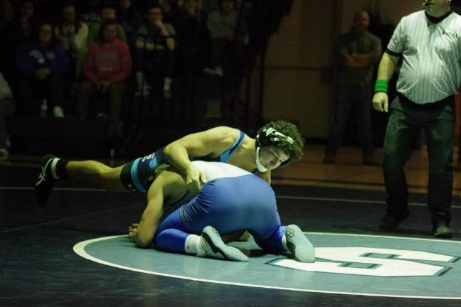 Sparta's Lucas Brown is on top of Kittatinny's Alex Laoudis in the 215-pound weight class. Brown won by ultimate tie breaker, 3-2.