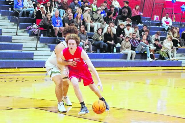 Lenape Valley's Dylan Van Tuyl dribbles the ball. He scored 11 points.