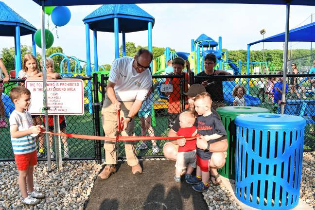 Inclusive playground opens Byram Mayor Alex Rubenstein cuts a ribbon to formally open the township’s completely inclusive playground Friday evening, June 6 at C.O. Johnson Park. (Photo by Maria Kovic)
