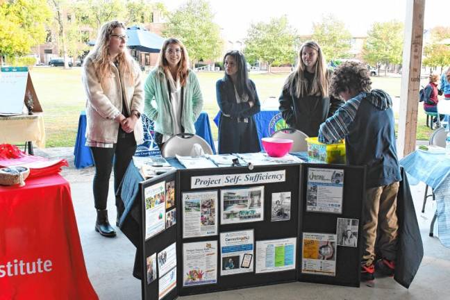Photos: Norwescap’s Fall Frolic in the Park Nonprofit organizations, such as Project Self-Sufficiency, offer information.