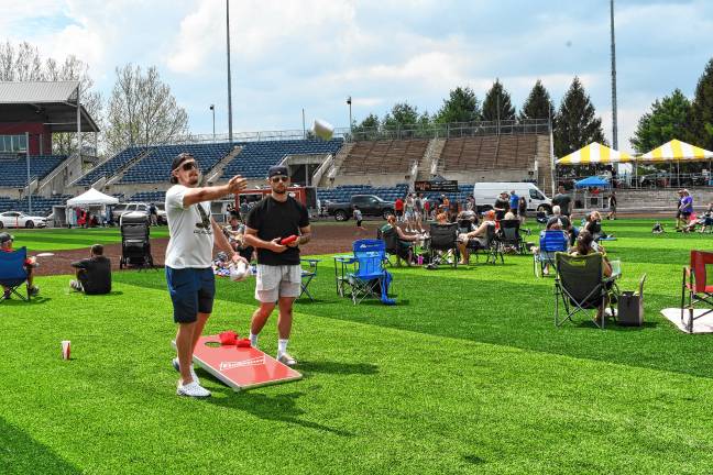 Miners open 10th season <b>Corn hole is one of the activities.</b>