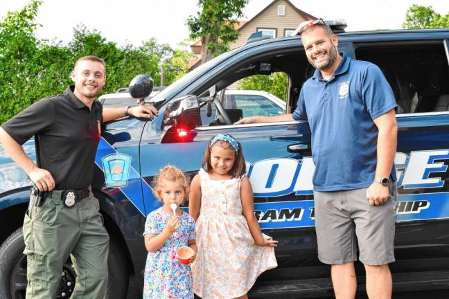 Cones with a Cop in Byram CC1 From left are Derek Kuncken, president of Byram Township PBA Local 406; Abigail and Eva Sarna; and Officer Christopher Spaldo at the Cones with a Cop event Thursday, July 18. (Photos by Maria Kovic)