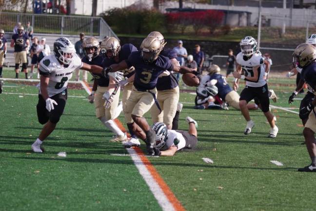 Newton, Sparta, Sussex Tech advance to semis in playoffs Pope John ball carrier Tylik Hill weaves his way through the St. Joseph of Metuchen defense Saturday, Oct. 28 in Sparta. The Lions lost the game, 10-6. (Photo by George Leroy Hunter)
