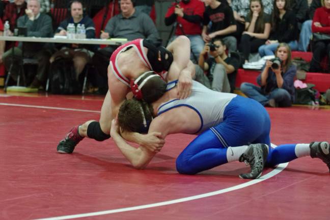 KRHS wrestling preview A Kittatinny wrestler in blue grapples with a High Point opponent at a last-season match in February
