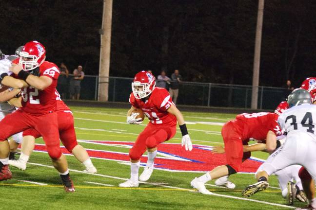 LVRHS beats Wallkill, 19-7 Lenape Valley ball carrier Cole Robertson finds a hole to move through. Robertson had 16 carries for 115 yards and a two-yard touchdown run.