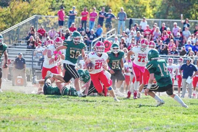 Football preview: Patriots’ strength is team chemistry, coach says <b>Sussex Tech defenders pursue Lenape Valley ball carrier Kevin Giusti, who rushed for 289 yards and scored two touchdowns in their game last year. (File photo by George Leroy Hunter)</b>