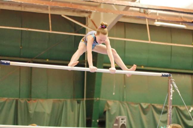 Westys hosts gymnastics invitational Gymnast Moya Lynch of Wantage, New Jersey performs on the uneven bars. Lynch took first place in the Bronze 8-9 division with an all around score of 34.50. She trains at Westys Gymnastics.