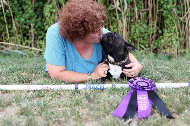 Unlikely champion French bulldog reaches kids Deb Stevenson and her beloved bulldog Soren Photo by M. Nicole Fischer Photography