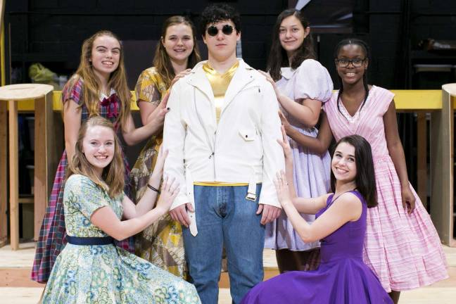 Kyle Penny (Senior) as Tommy, surrounded by fans. Back row, from left: Jocelyn Mull (Sophomore), Emily Kurnides (Junior), Hayden Caico (Sophomore) and Danielle Ham (Freshman). Front row from left: Allyson McDonnell (Junior) and Emily Herring (Senior)