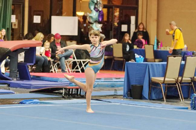 Westys gymnast Rachael McKenna in a pose during her floor routine.