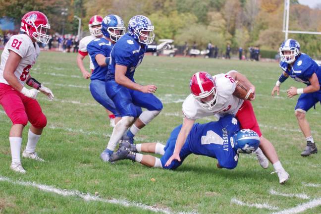 Lenape Valley ball carrier John Lyons is tackled by Kittatinny defender Ryan Connelly in the second quarter.