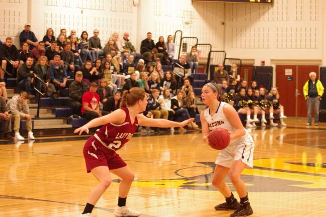 Jeffereson's Taylor Langan dribbles the ball while covered by Newton's Emily Pappas. Langan scored 22 points. Photos by George Leroy Hunter