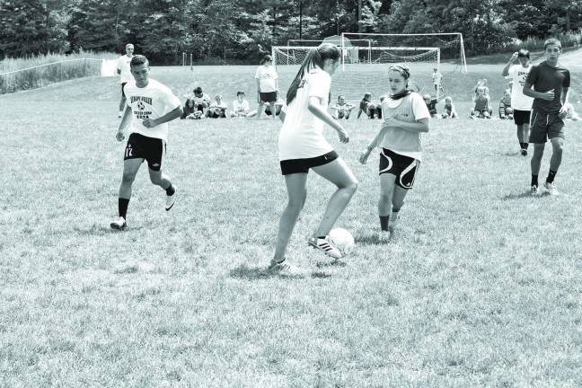 Youngsters learn soccer fundamentals during camp Youngsters learn soccer fundamentals during camp