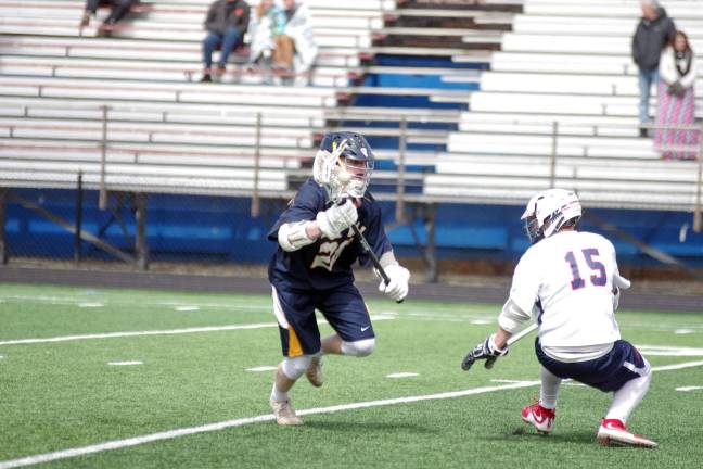 Lenape Valley falls in boys lacrosse Delaware Valley's Tyler Neal carries the ball past Lenape Valley's Nick Molinari. Neal scored five goals.