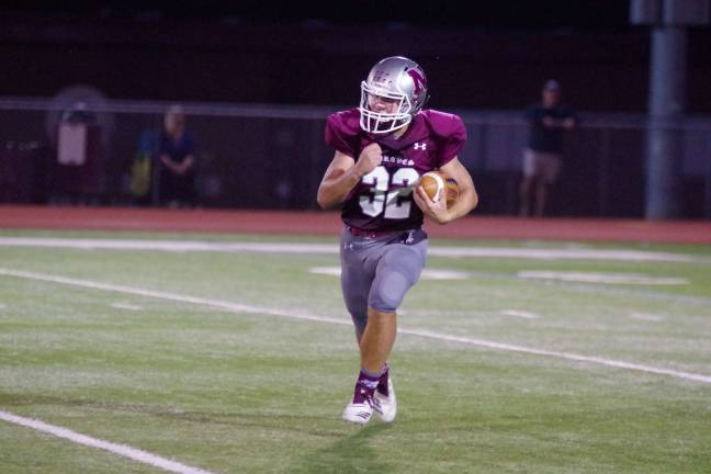 Newton Braves keep rolling Newton punt returner Peyton Nolan on the run in the first quarter.