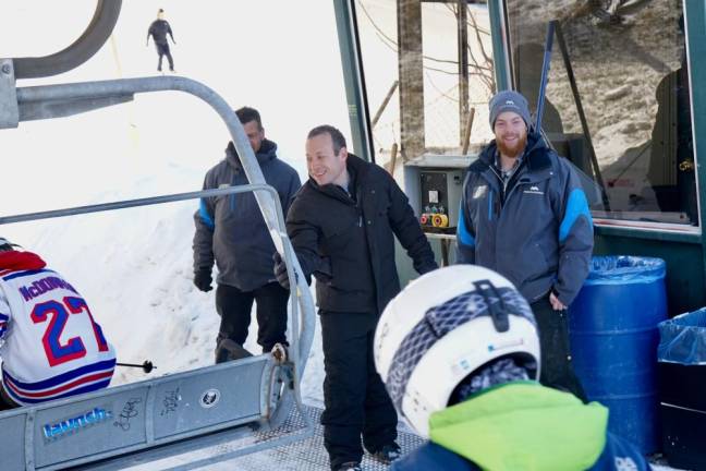 Congressman Josh Gotheimer helps operate the ski lift Saturday, Feb. 22, 2020 at Mountain Creek in Vernon.