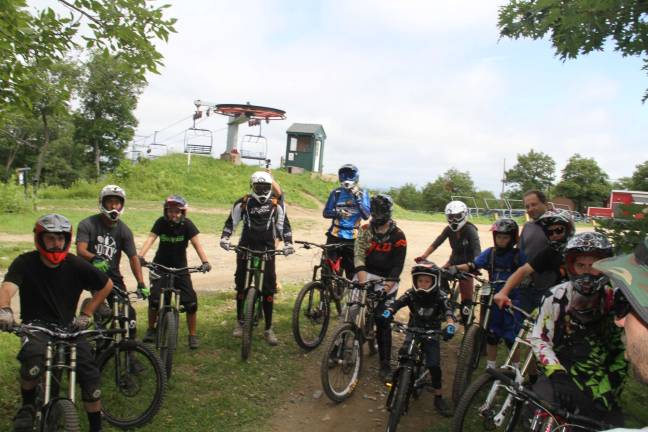 Mountain Creek Bike Park opens new top-to-bottom beginner trail Photos by Amy Cilli A group of bikers waiting to hit the new trail.