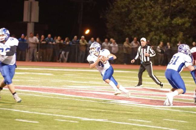 Braves defeat Kittatinny 28-17 Kittatinny quarterback James Franco carries the ball in the first half. Franco threw for 112 total yards and he rushed for 65 yards.