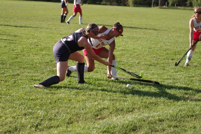 High Point tops LVRHS in field hockey opener Lenape Valley's Tara Charette and High Point's Katherine Leal clash.