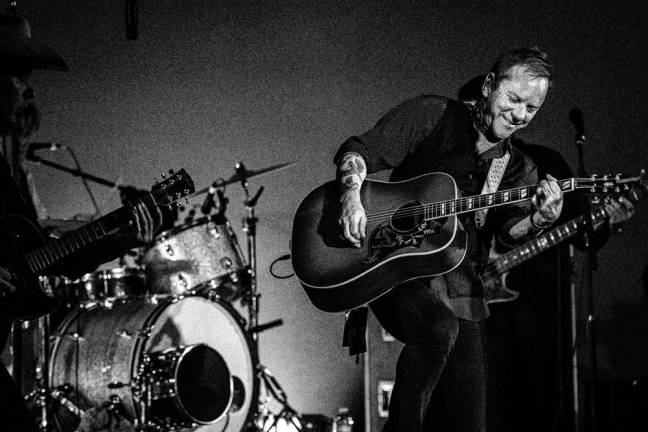Welcome summer with music, words Kiefer Sutherland performs Sunday night at the Newton Theatre. (Photo by Beth Elliot)