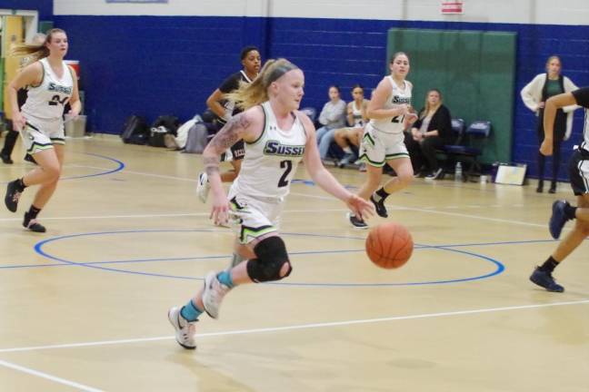 Sussex County's Phoebe H. Livingston dribbles the ball in the first quarter.
