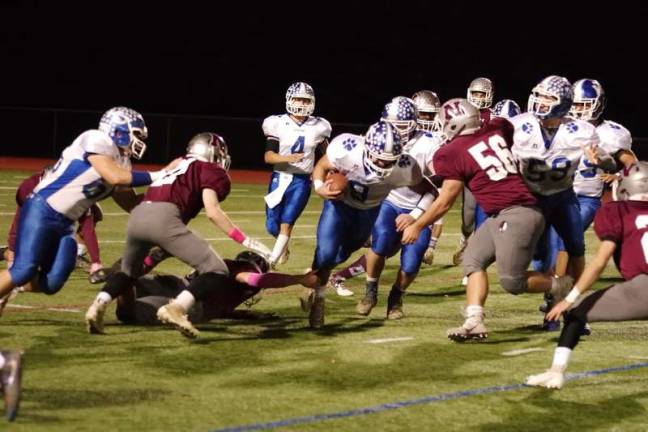 Braves defeat Kittatinny 28-17 Kittatinny ball carrier Anthony Cagno is confronted by Newton defenders in the first half. Cagno scored a rushing touchdown in the second quarter.