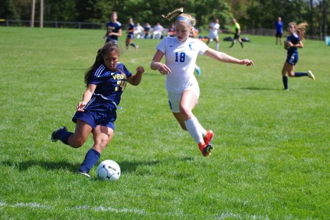 Cougars maul Vikings in girls soccer Vernon's Mariah Curiel is challenged by Kittatinny's Olivia Redden for control of the ball.