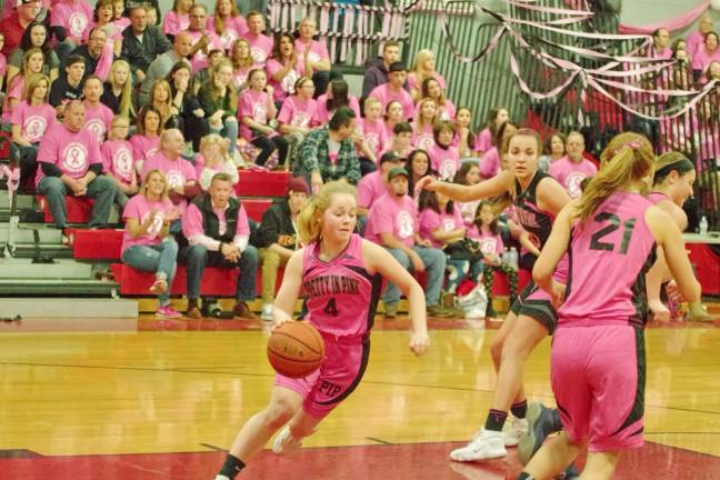 High Point prettier in pink than Newton Newton's Jenny Boyer dribbles the ball in the second period. Boyer scored two points.