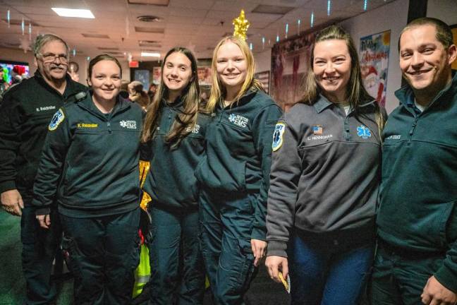 Photos: Tree Lighting in Newton Members of the Newton Volunteer First Aid and Rescue Squad.
