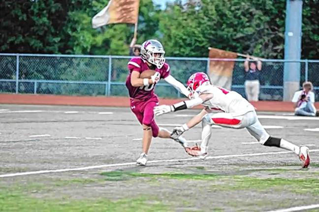 Football preview: Braves prepared for new season, coach says Newton kick returner Hunter Wolfe, left, attempts to avoid Lenape Valley defender Chase De Oliveira in a game last season. (File photo by George Leroy Hunter)