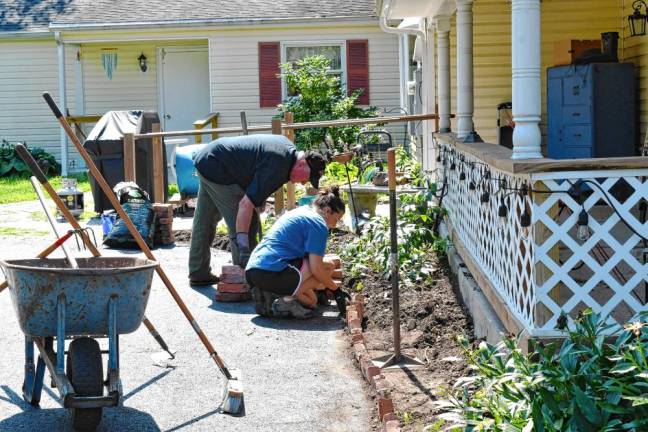 Photos: Volunteer Day at Rebecca’s Homestead <b>The nonprofit organization invited volunteers to help out in exchange for a meal Friday, July 26. </b>