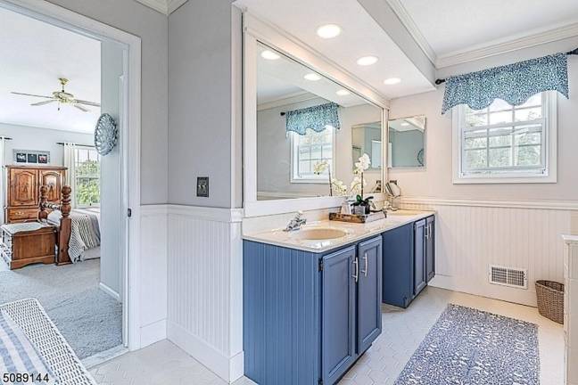 Home with classic beauty is nestled in a mature landscape Home with classic beauty is nestled in a mature landscape