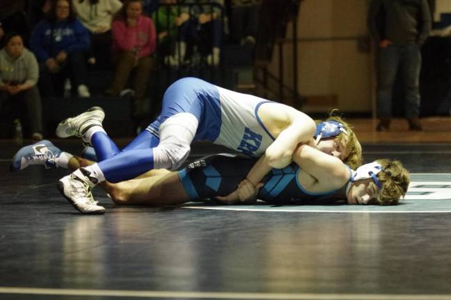 Kittatinny's Blake Giangrasso gets on top of Sparta's Andrew Weinzetl in the 126-pound weight class. Giangrasso won by major decision, 13-4.