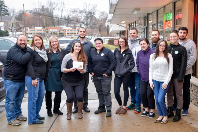 Photo studio provides Christmas gifts for 85 children From left; Anthony Ziccardi, Alison Paling, Nicole Pierson, Alison Tukel, Benjamin Davey, Dayana Orella, Emily Schuch, Eddie Matias, Kelly Tomzick, Kenny Clay, Dani Bender, Elise Dikkenberg and Brian Levitsky
