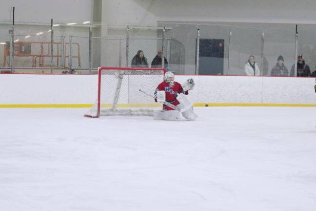 Newton/Lenape Valley goalie Ryan Salerno reacts to an incoming puck.