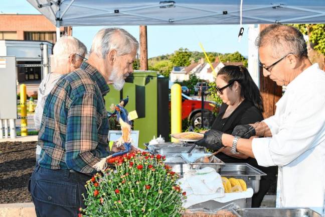 Photos: Taste of Newton Restaurants and culinary businesses offer samples of their cuisine at Taste of Newton on Monday, Sept. 9 in the Central Plaza Parking Lot. (Photo by Maria Kovic)