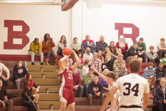 NW3 Newton's Nick Kurilko in the midst of a shot attempt during the first half.