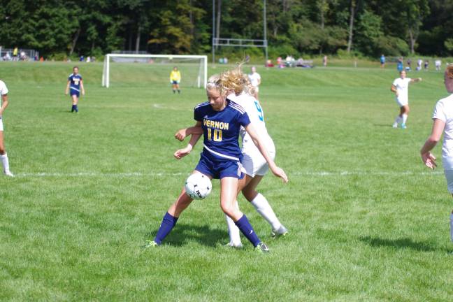 Cougars maul Vikings in girls soccer Vernon's Madeline Labance controls the ball. Labance scored one goal.