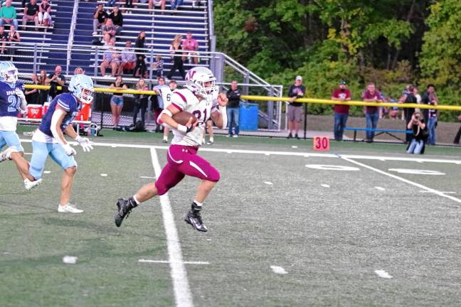 Football roundup: High Point remains undefeated <b>In the second quarter, Newton running back Nick Kurilko makes it to the open field. He scored two touchdowns.</b>