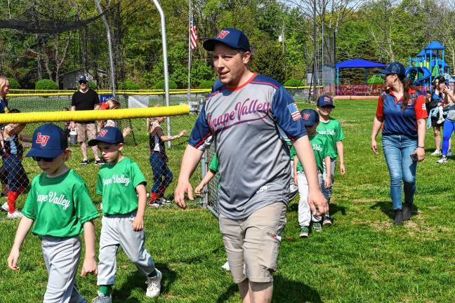 Photos: Lenape Valley Little League opening day Players and coaches march onto the field at C.O. Johnson Park in Byram.
