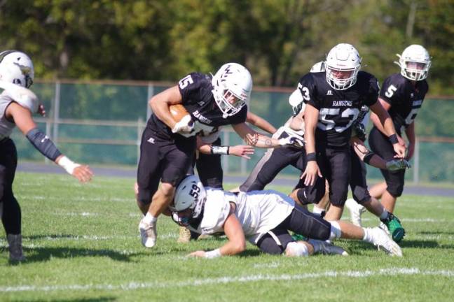 Wallkill Valley running back Brandon Campbell carries the ball in the fourth quarter. Campbell achieved one rushing touchdown in the game.