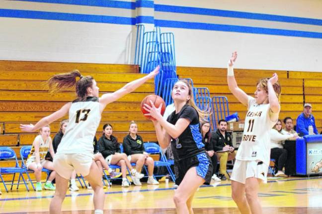 KT3 Kittatinny's Gianna Caruso looks up just before a shot attempt. She scored 10 points. (Photo by George Leroy Hunter)
