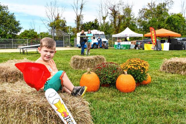 Photos: Stanhope Fall Festival Cameron Riccardi of Stanhope plays among the pumpkins at the Stanhope Fall Festival on Saturday, Sept. 27. (Photos by Maria Kovic)