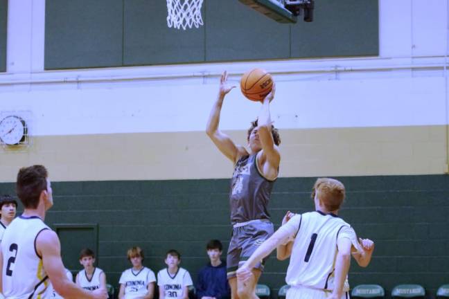 Sussex Tech's Justyn Hetman (24) shoots in the first half of the game against Koinonia Academy on Saturday, Jan. 6. He scored 13 points and grabbed five rebounds. (Photos by George Leroy Hunter)