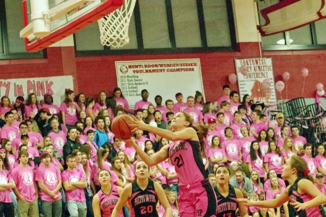High Point prettier in pink than Newton Newton's Maddie Gore takes the ball towards the basket in the first period. Gore scored a team-high 20 points. Photos by George Leroy Hunter