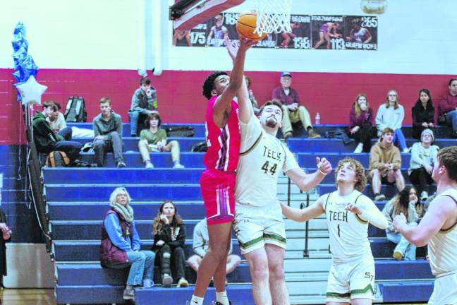 Lenape Valley's Gabriel Quarranttey takes the ball toward the hoop as Sussex Tech's Dane Walker defends. Quarranttey scored seven points.