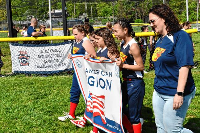 Photos: Lenape Valley Little League opening day Lenape Valley Little League teams march onto the field carrying banners opening day Saturday, May 3.