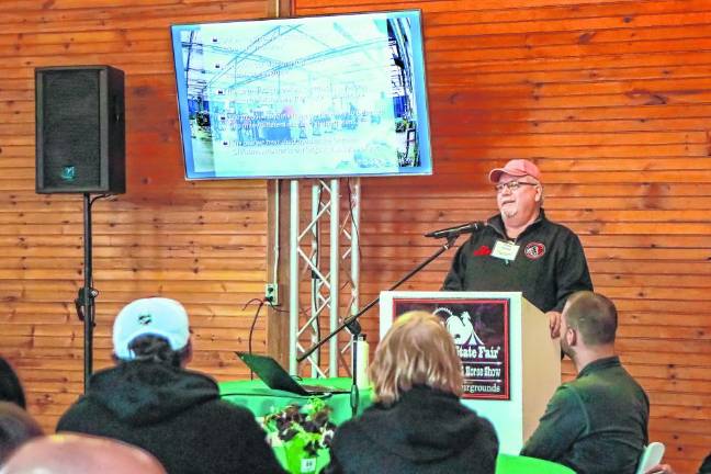 Birger Luecht of the Pocono Mountain Garden Railway Society speaks. That group sets up a model train display at the annual German Christmas Market at the fairgrounds. (Photo by Brielle Kehl)