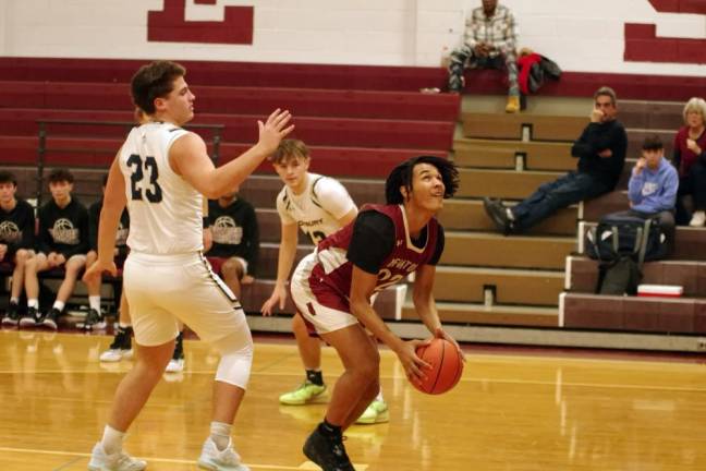 Newton's Kasai Goritski handles the ball in the third period.